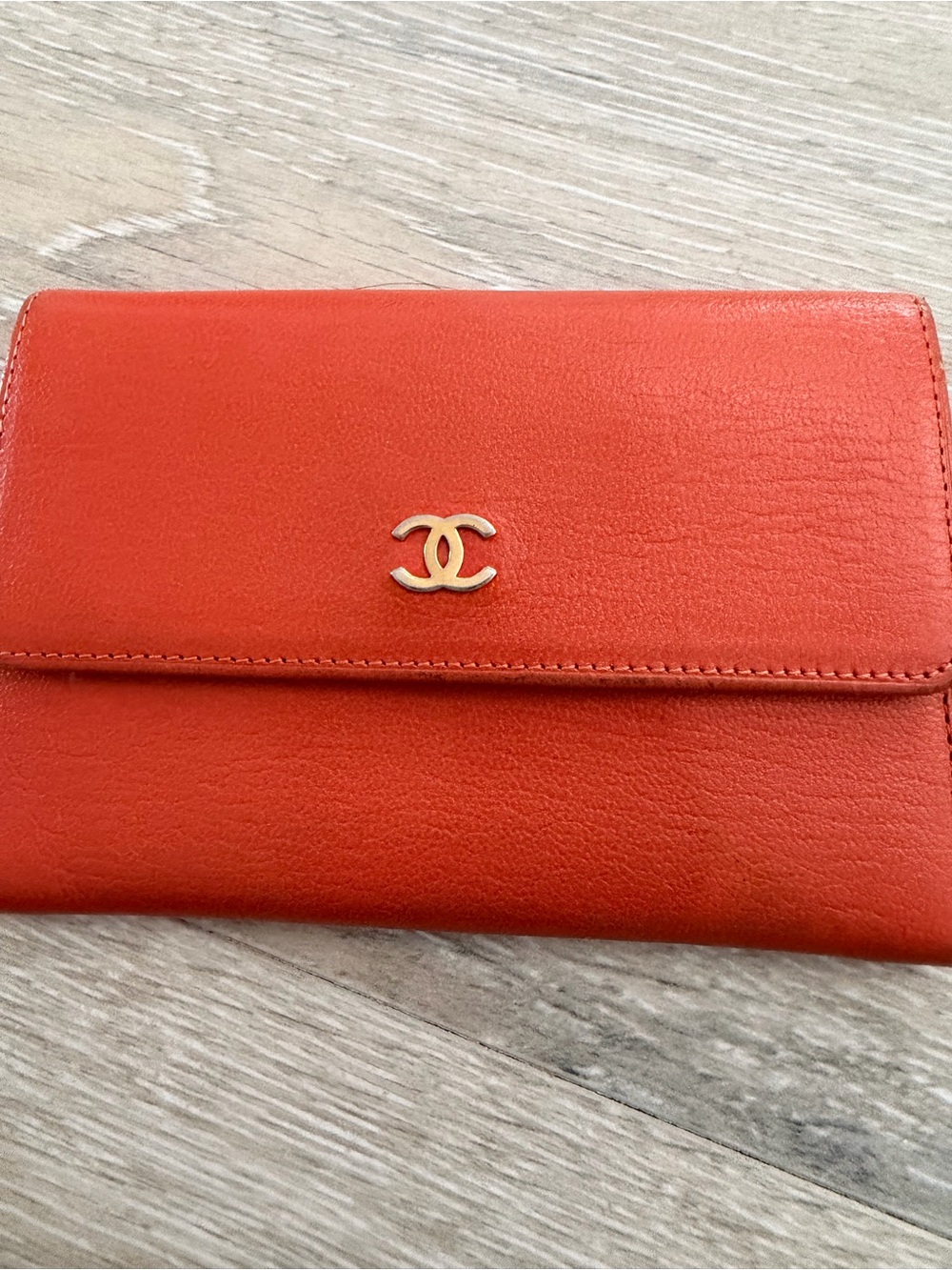 CHANEL Orange Leather Wallet with Gold CC Emblem